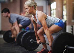 Shot of two people lifting weights in a gymhttp://195.154.178.81/DATA/i_collage/pu/shoots/806094.jpg